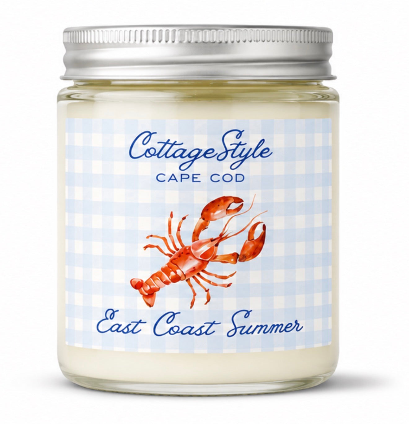 Candle jar with a lobster illustration and 'Cottage Style Cape Cod' text on a checkered background