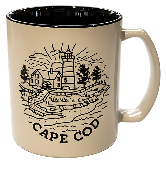 Cape Cod themed lighthouse mug with black interior and handle on a beige exterior
