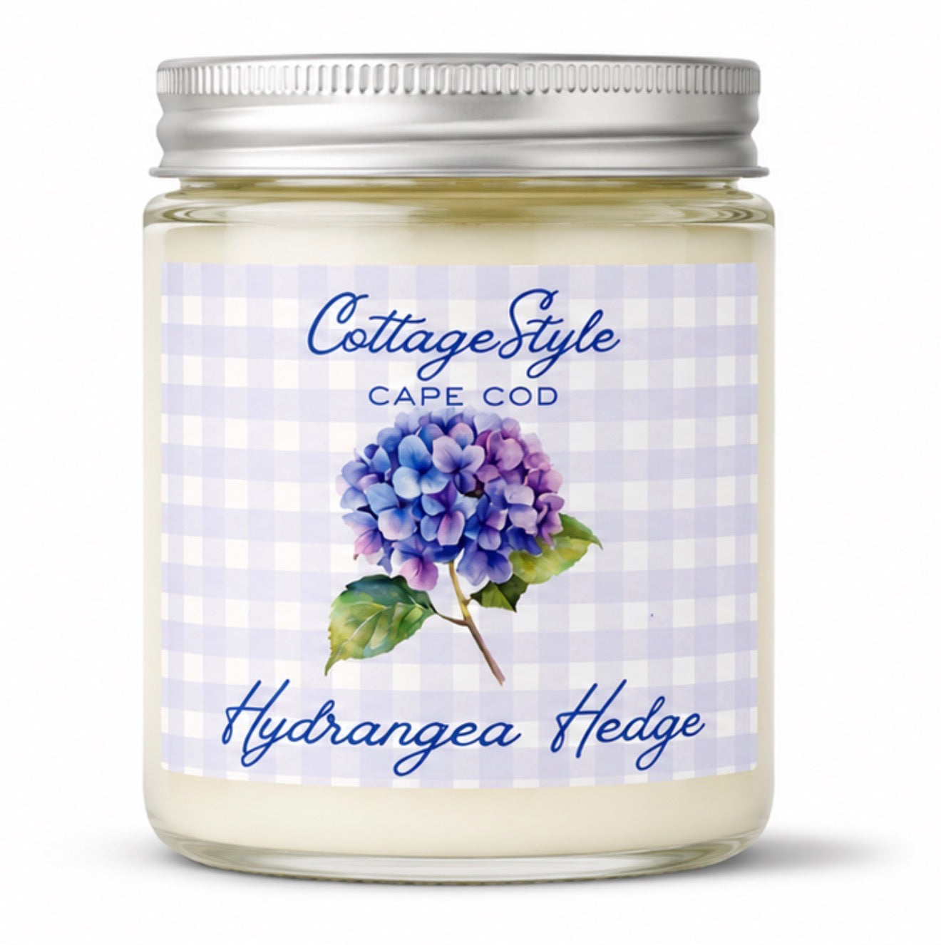 Candle jar with a label featuring hydrangea flowers and 'Cottage Style Cape Cod' text on a white background.